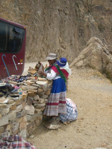 Quechua woman with a baby on her back